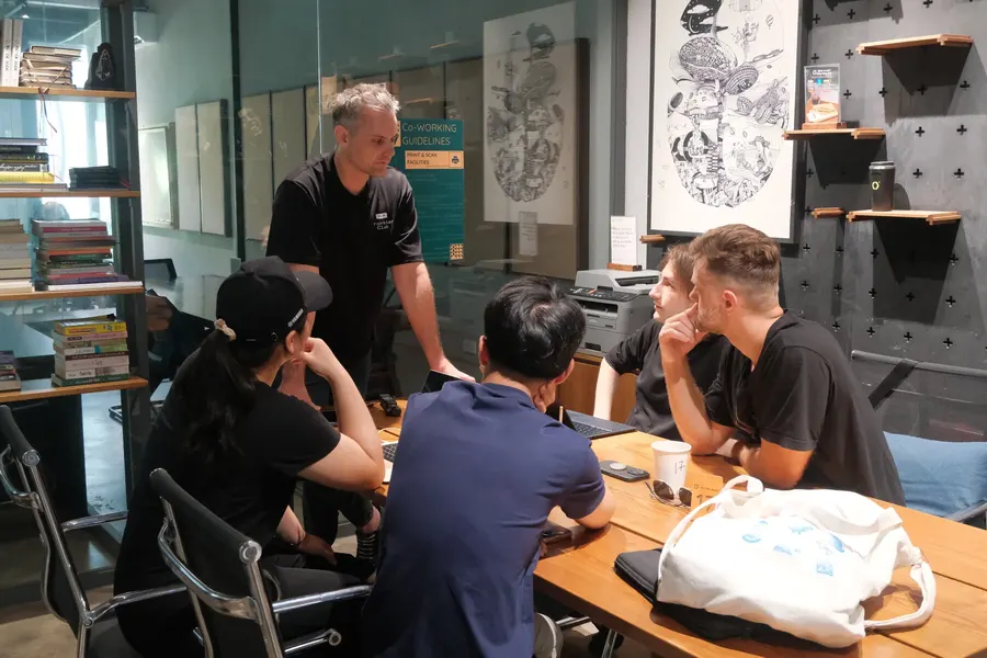 A hands-on workshop with people working at tables